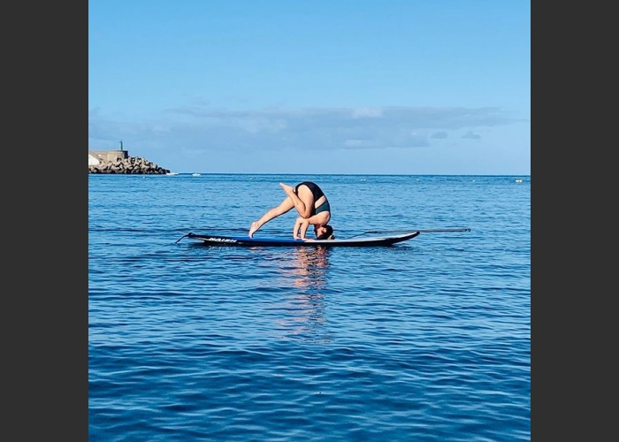 Combine meditation with surfing in a SUP Yoga class