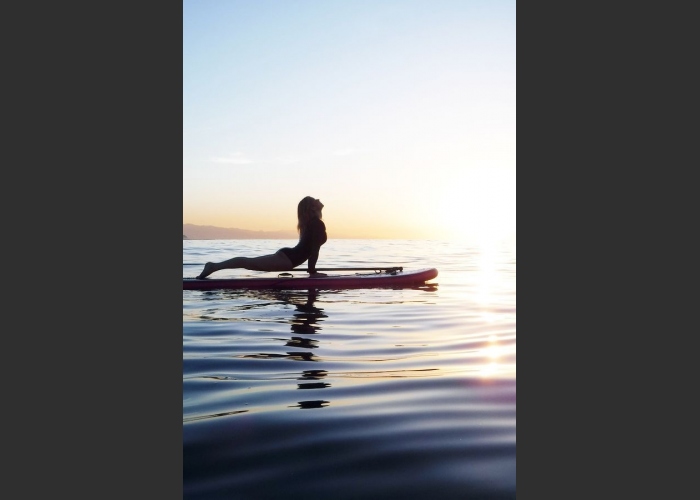 Combine meditation with surfing in a SUP Yoga class