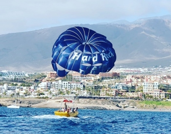 Experience the Thrill of Parascending over the Stunning Waters