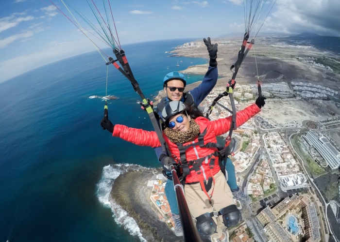 Fly over the stunning south coast of Tenerife in a tandem paraglider