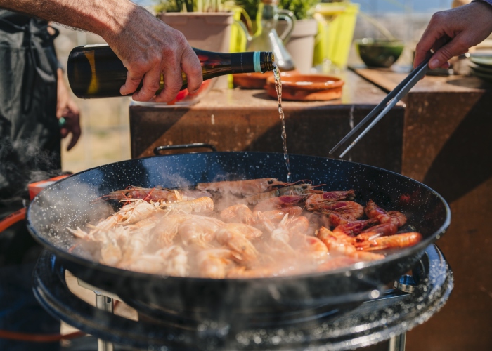 Paella Cooking with a chef, winery tour & sunset sailing to Barcelona